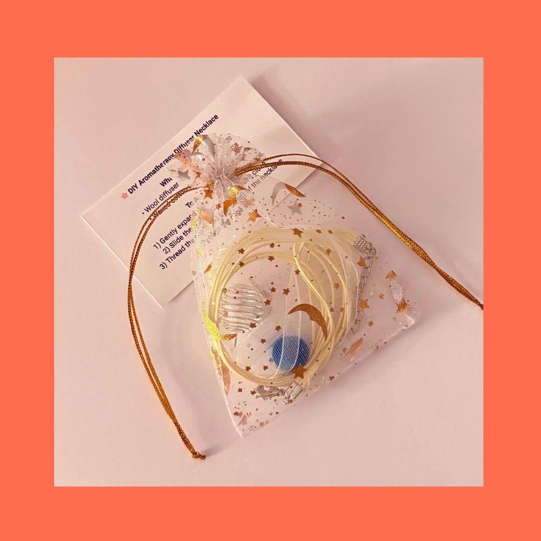 organza drawstring bag with DIY aromatherapy necklace kit plus instruction card