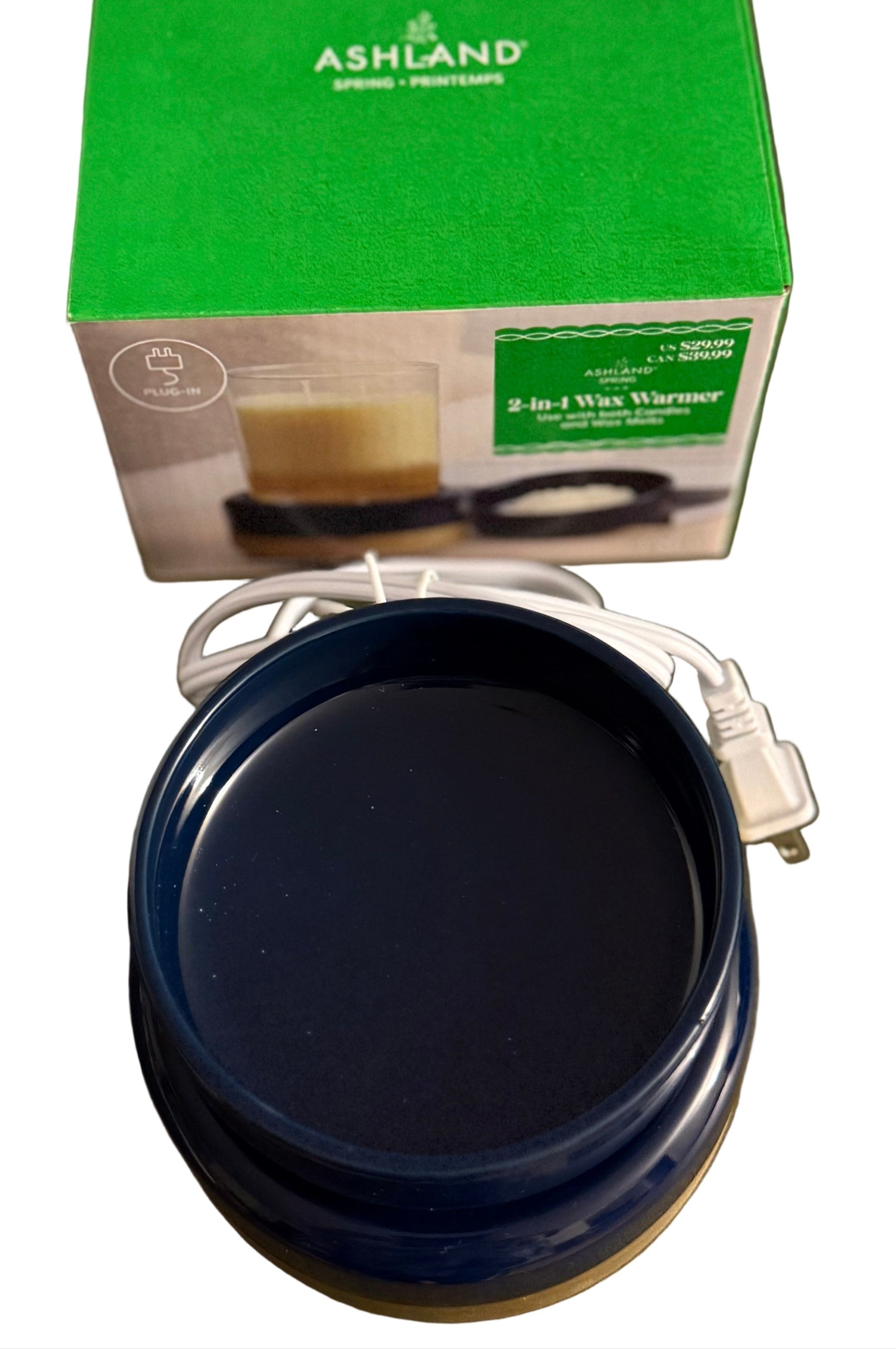 2 in 1 wax/candle warmer with electric cord and box in the background